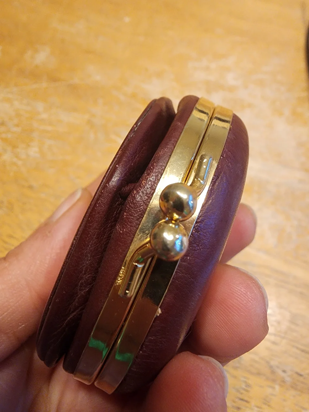 vintage Christian Dior maroon leather kiss-lock coin purse embossed Logo